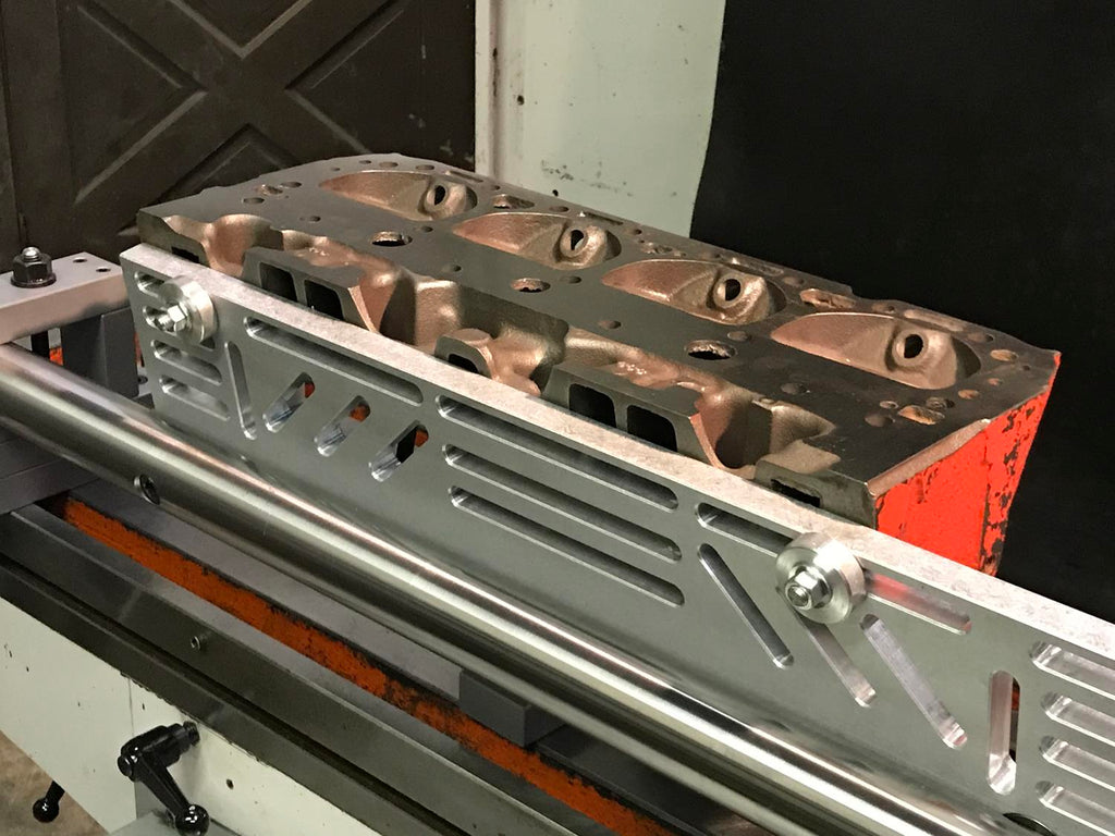 Cylinder head mounting plate for resurfacing machines