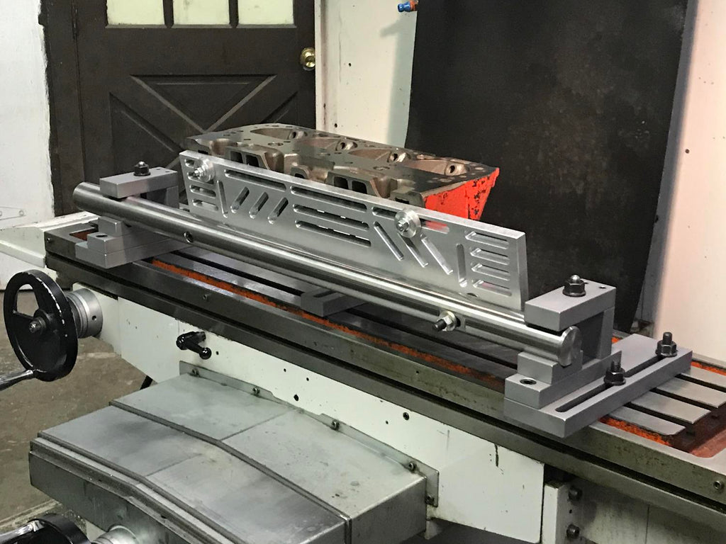 Cylinder head mounting plate for resurfacing machines